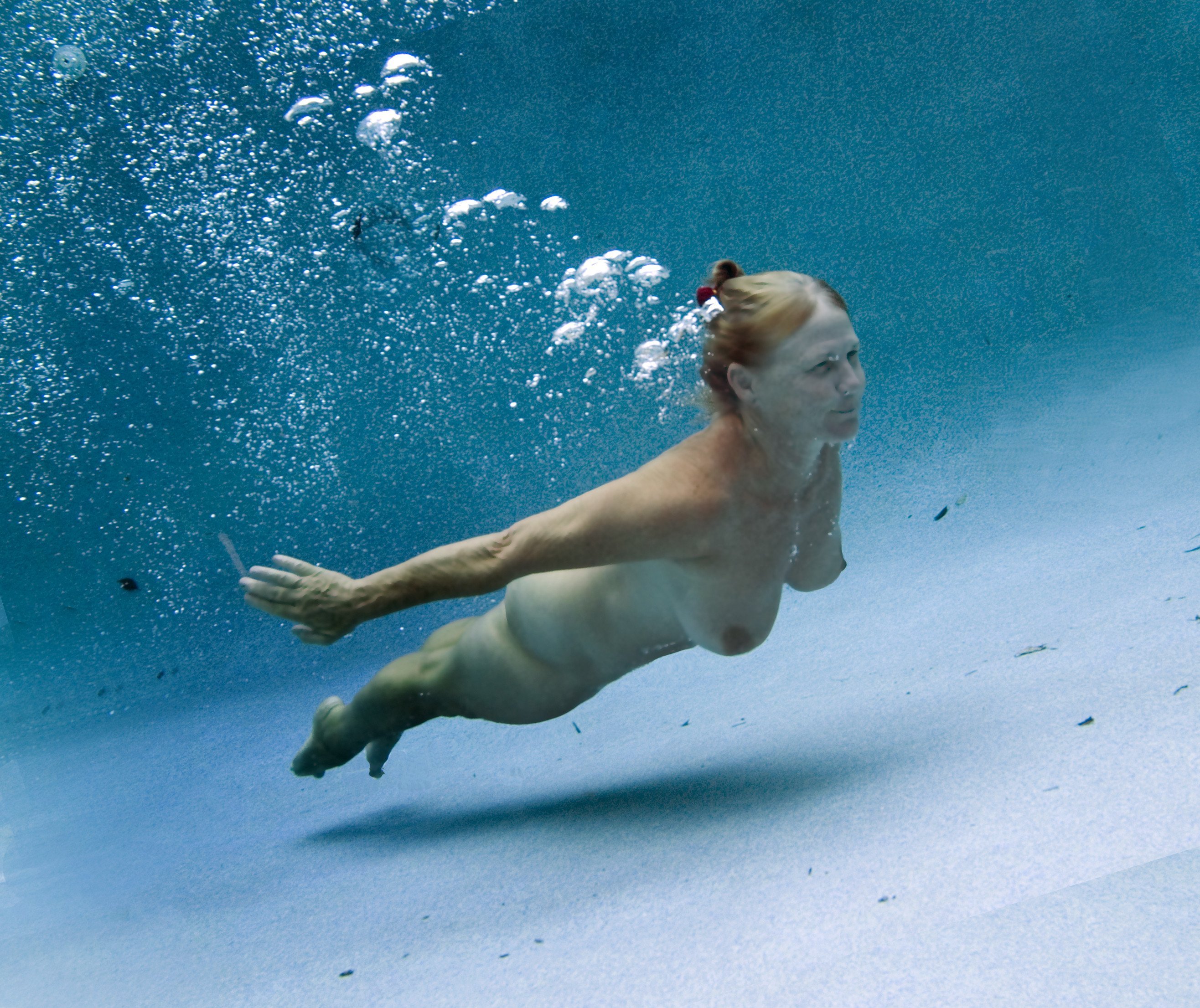 Female nude swimming
