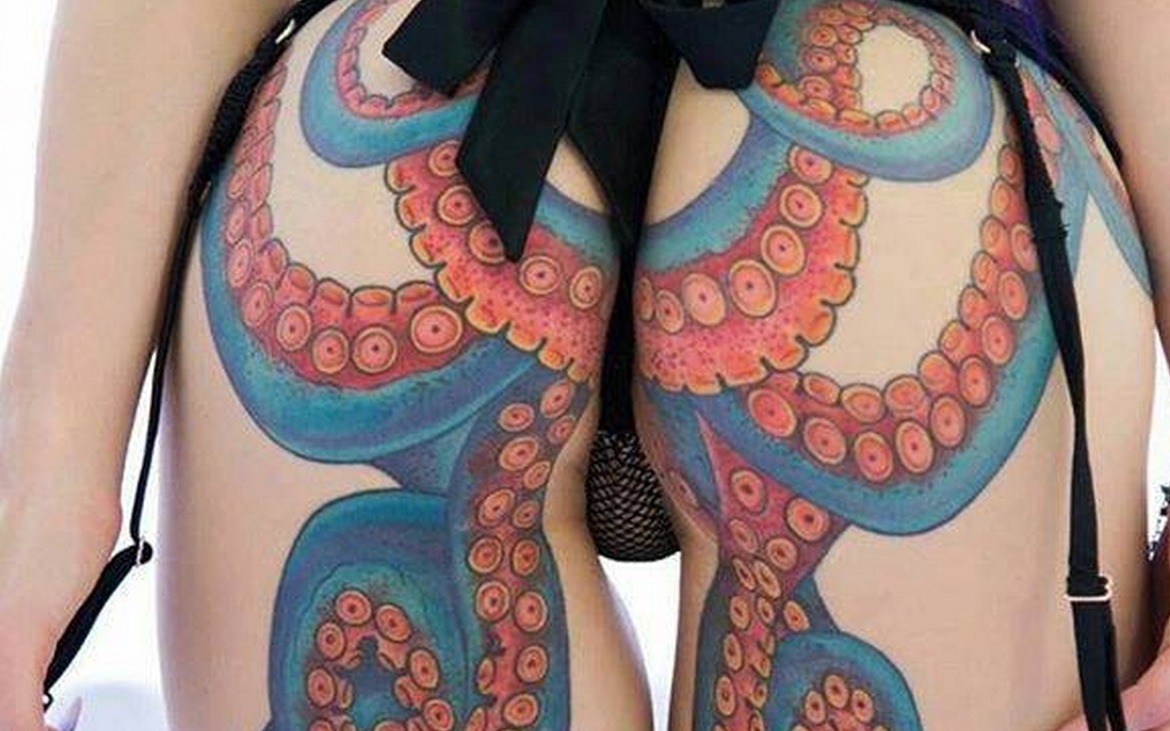 Pornstar with octopus tattoo