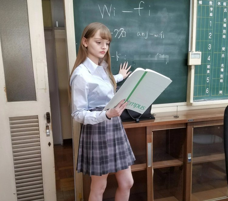 Учитель в школе