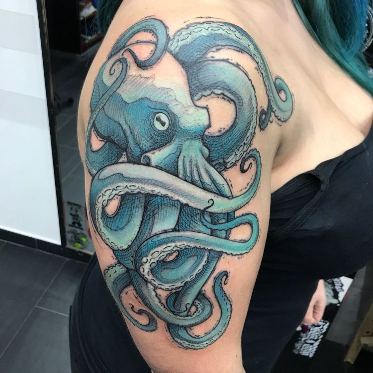 Тату осьминог на попе