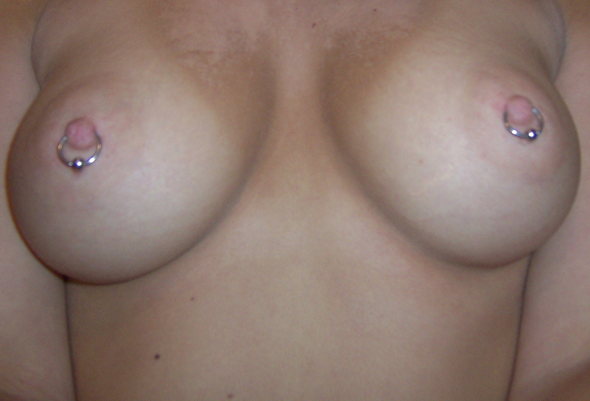 пирсинг груди для женщин фото 31