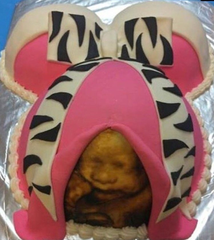 Торт в виде рождающегося ребенка