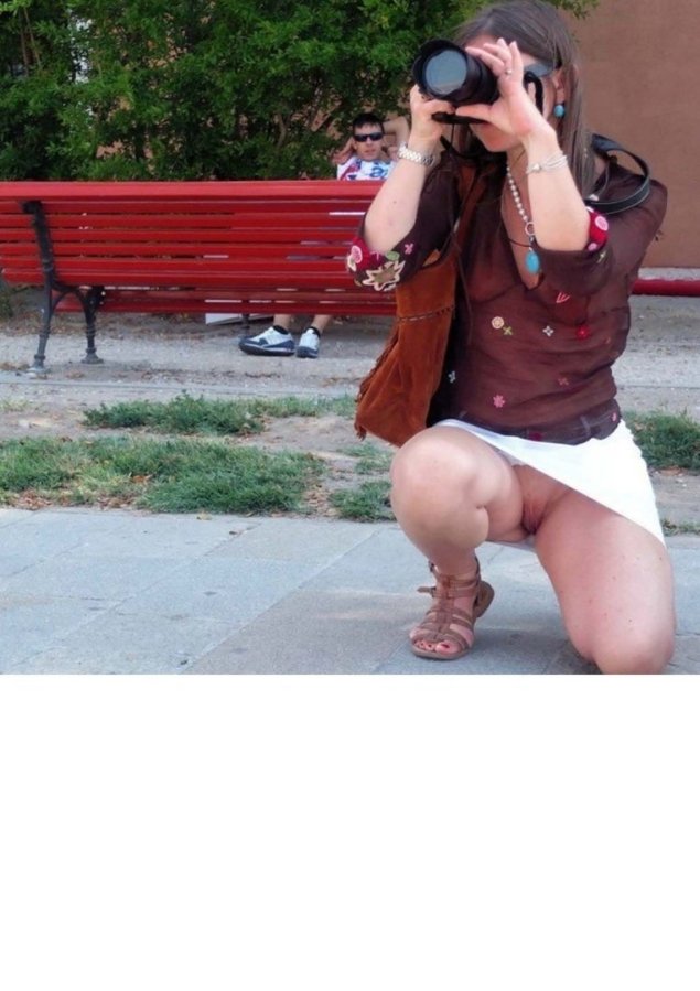 Девушка фотограф засветила